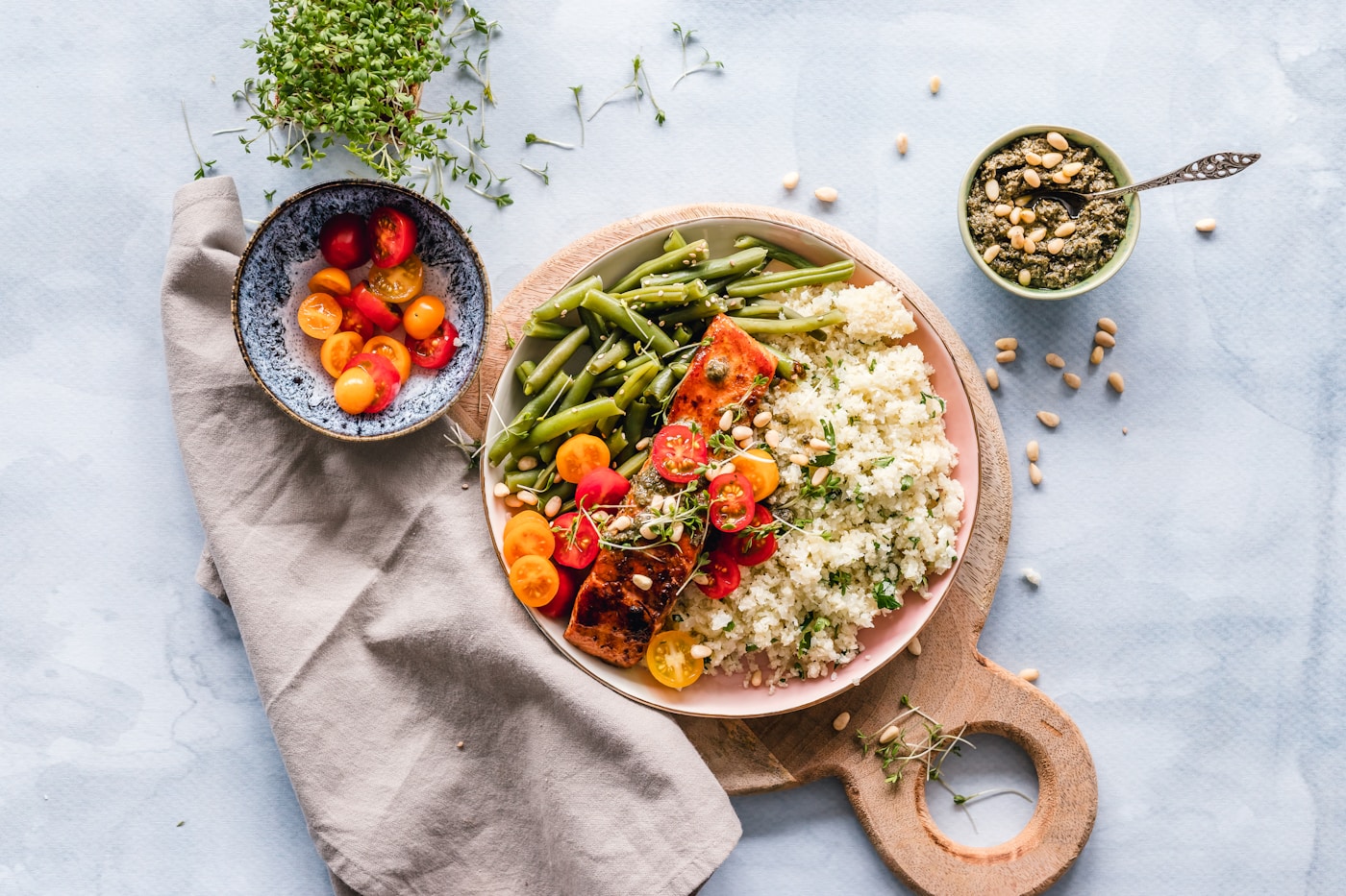 A colorful prepared family meal with vegetables and rice